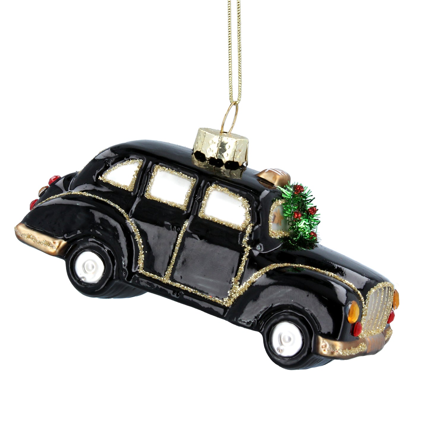 A glass decoration in the shape of a famous London Taxi with a shiny accents and a festive green wreath on top.