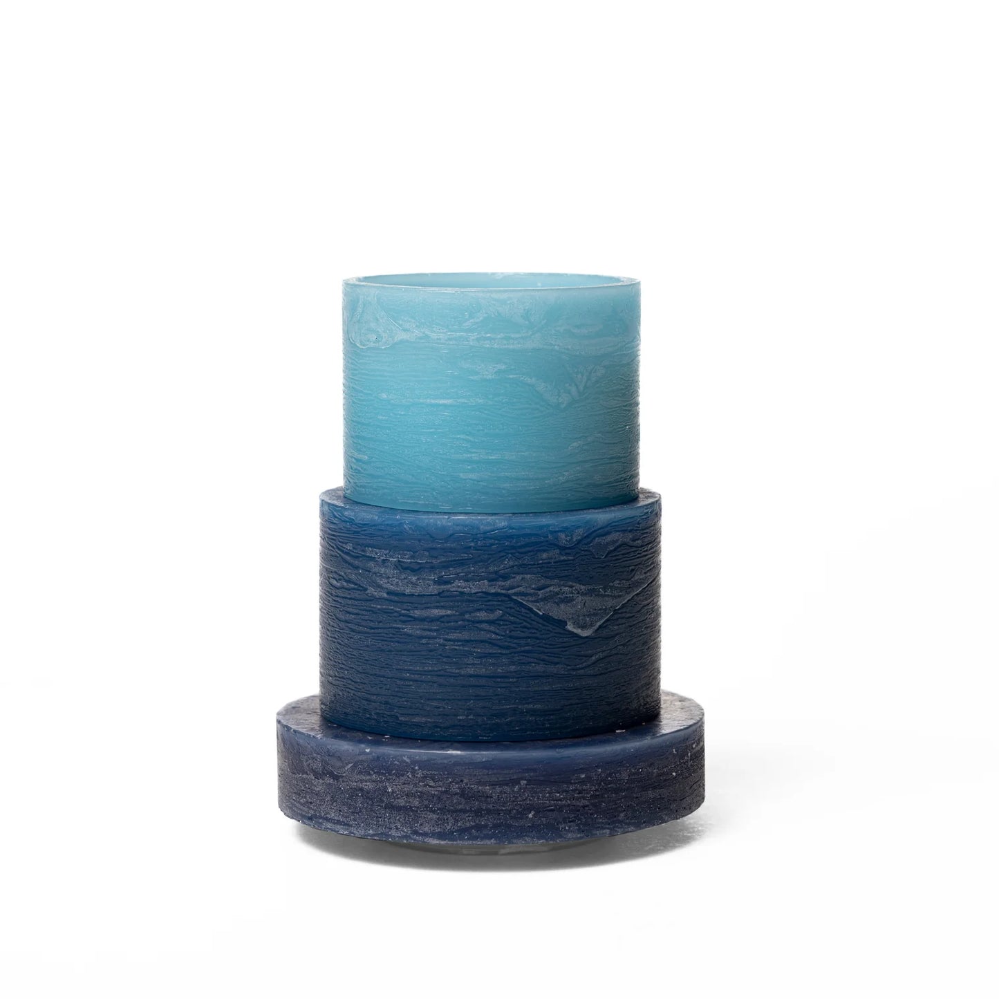 A blue 3-layered stacked candle
