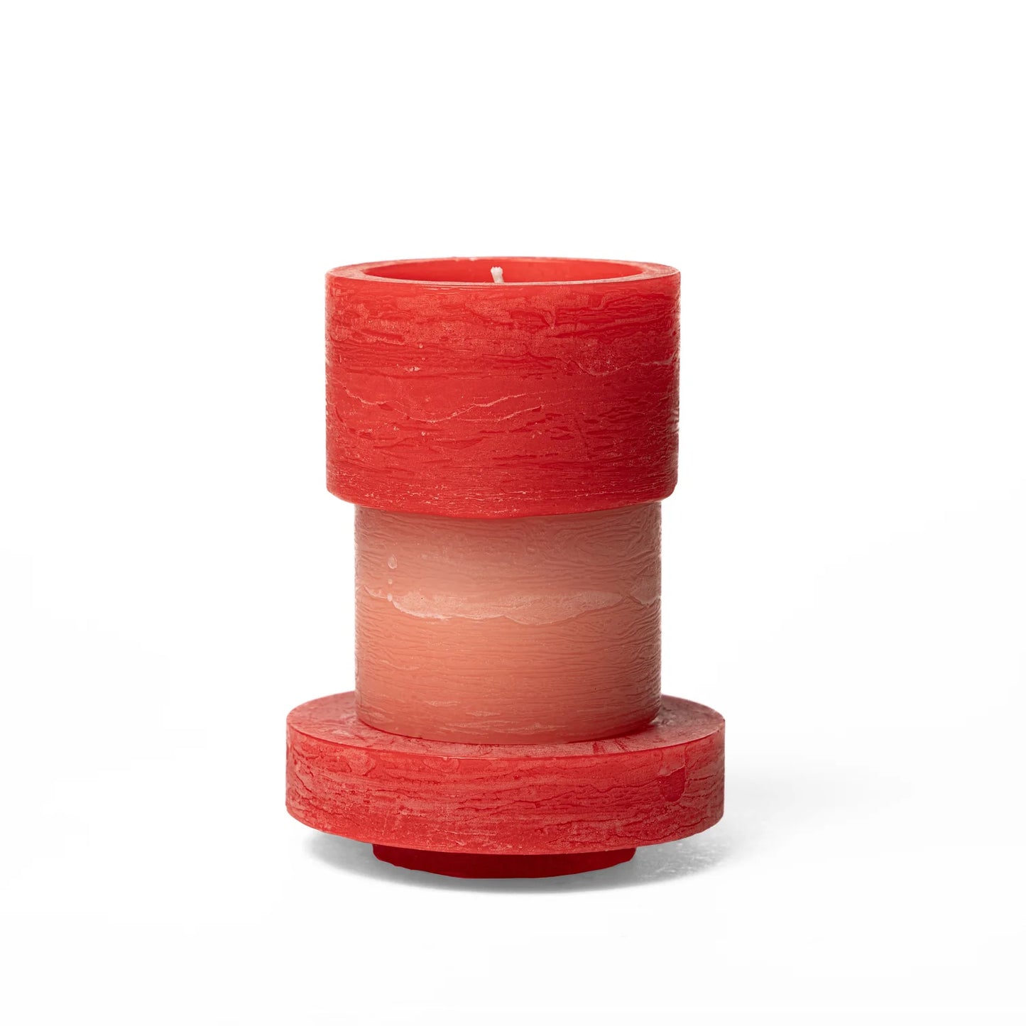 A red and pink 3-layered stacked candle