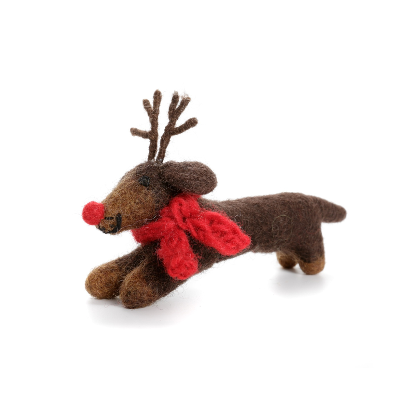 Small brown sausage dog decoration with reindeer antlers,  a red knitted scarf against a white background