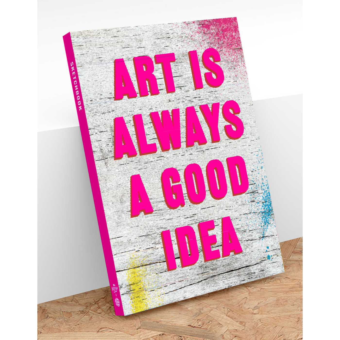 A sketchbook with a white and pink cover, titled 'ART IS ALWAYS A GOOD IDEA' in bold pink letters.