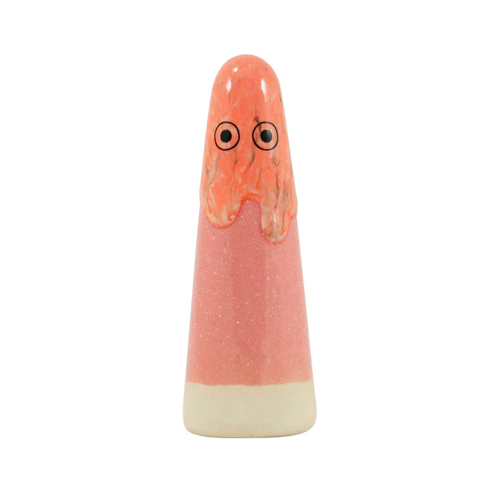 A cone-shaped ceramic figurine with hand-painted eyes