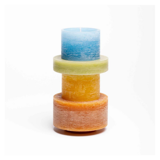  candle made up of 4 different colour components, stacked vertically.