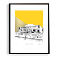 Framed architectural drawing of a building with a yellow background
