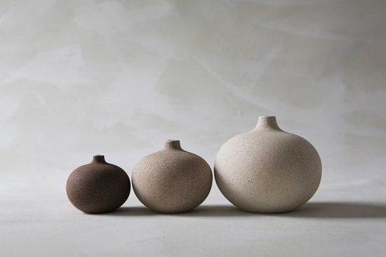 A set of three round ceramic vases by Lindform, placed from small to large size.