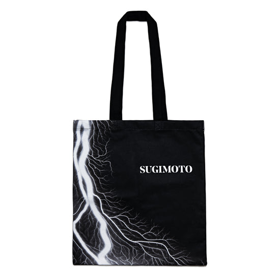Load image into Gallery viewer, Hiroshi Sugimoto exhibition tote bag featuring &amp;quot;Sugimoto&amp;quot; text and the artist&amp;#39;s lightning fields artwork.
