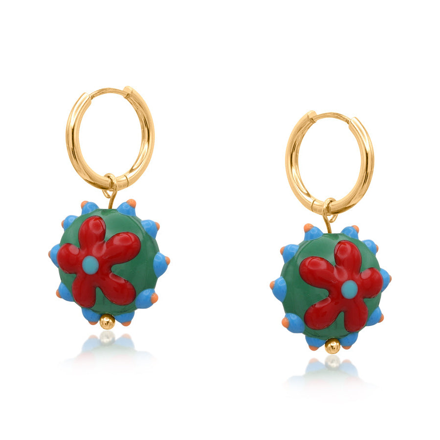 Pair of gold hoop earrings with colourful floral designs on a white background