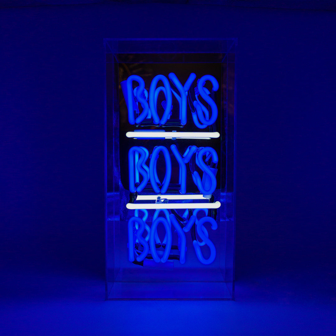 Neon sign with 'BOYS' text on a blue background