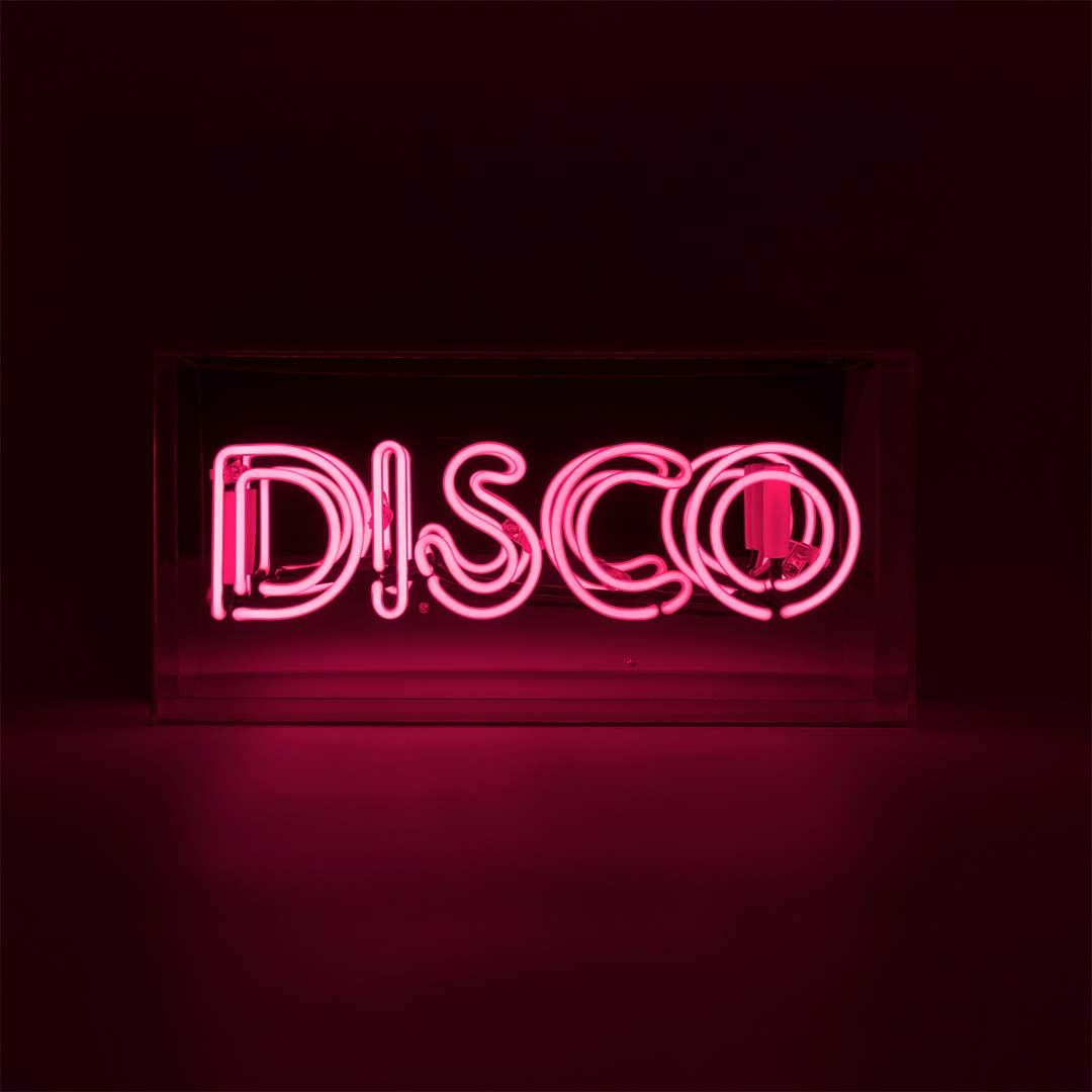 Neon sign with 'DISCO' in pink on a dark background