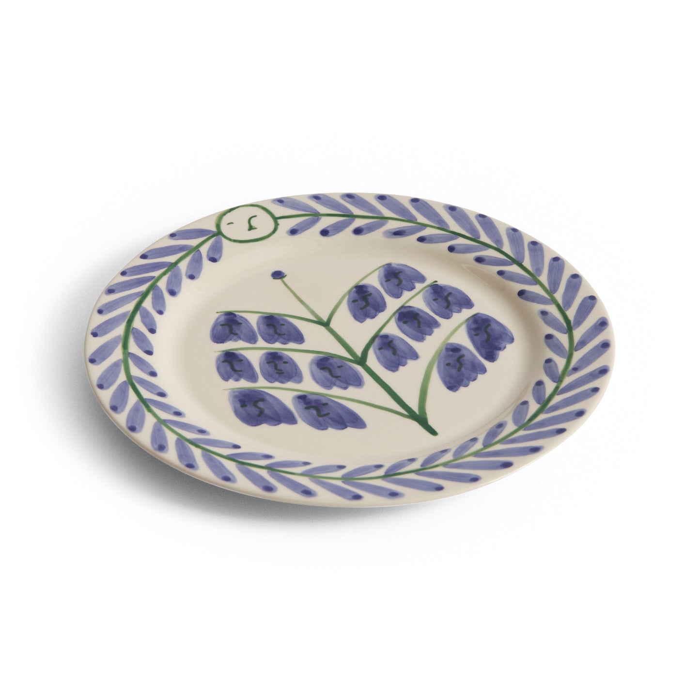 Ceramic plate with floral design on a white background