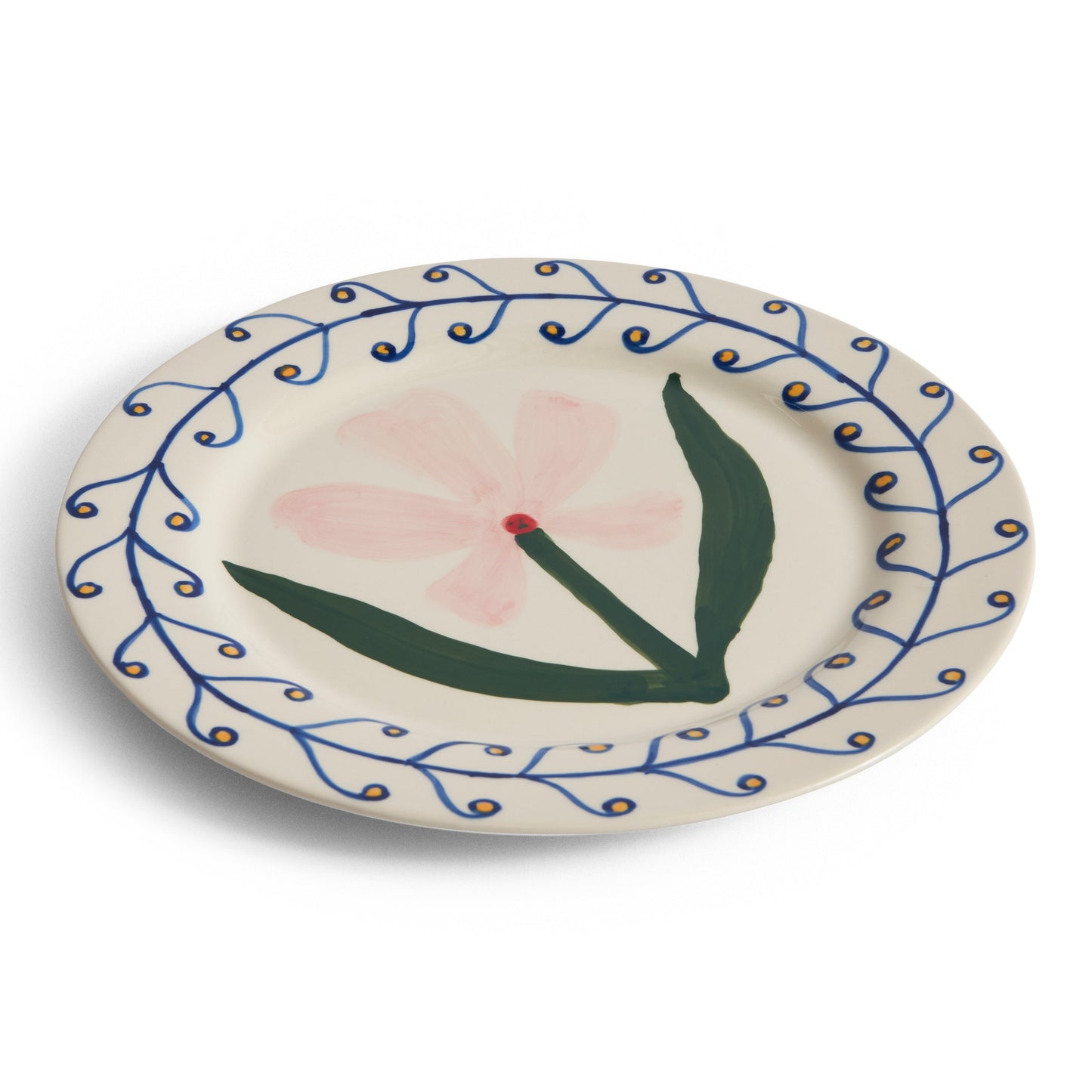 Ceramic plate with floral design on a white background