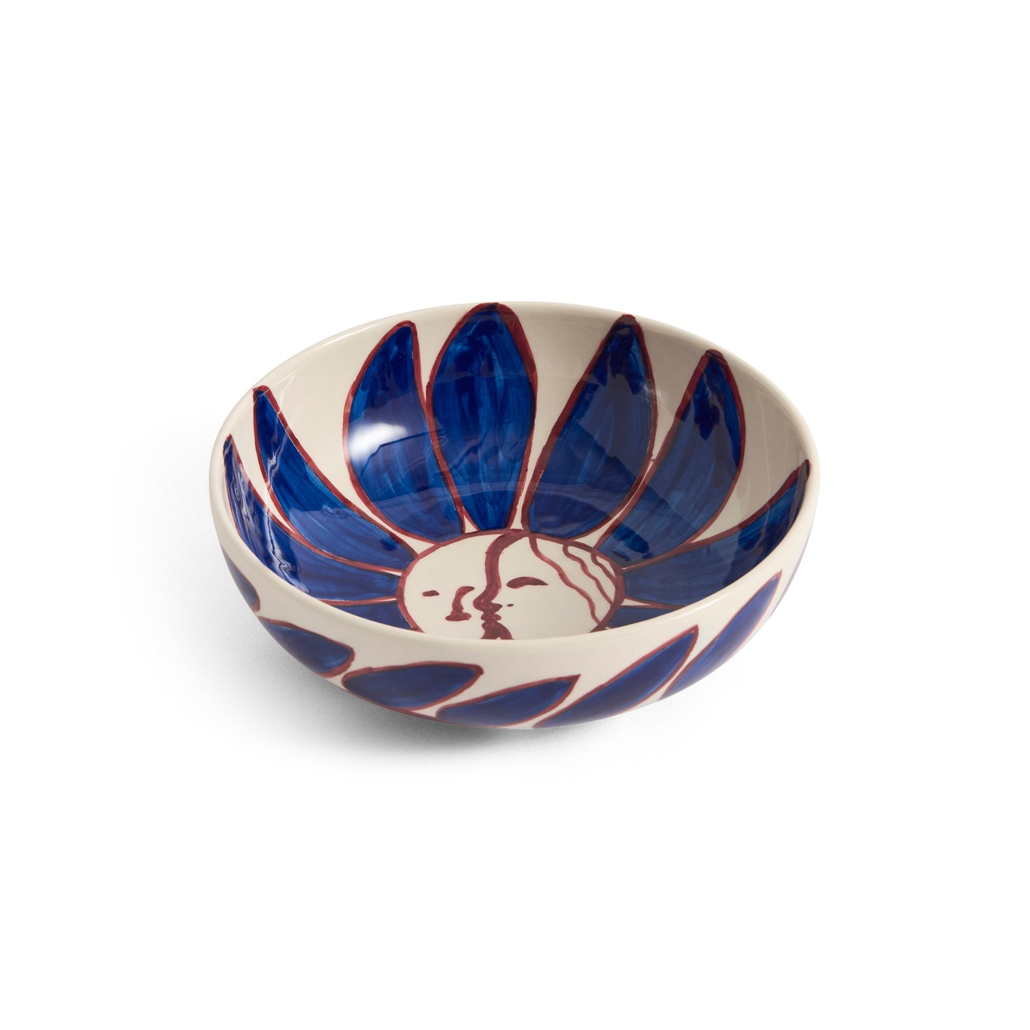 Ceramic bowl with blue and white design on a white background