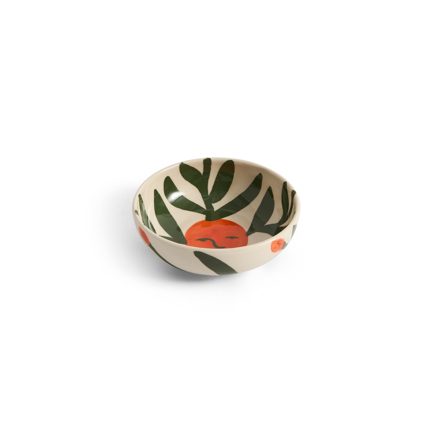 Small decorative bowl with leaf pattern on a white background