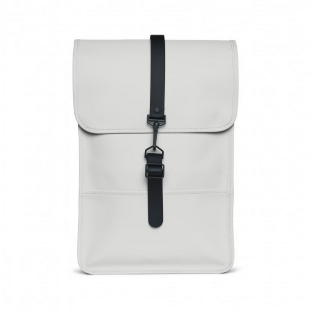 
                  
                    Front side of the Rains Backpack Mini, with a single black strap located in the middle, colour ash.
                  
                