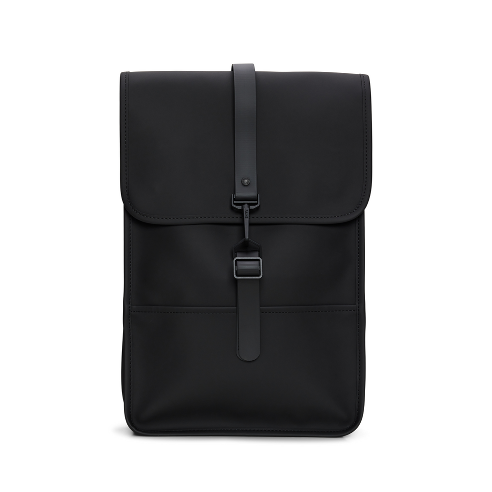 
                  
                    Front side of the Rains Backpack Mini, with a single black strap located in the middle, colour black.
                  
                