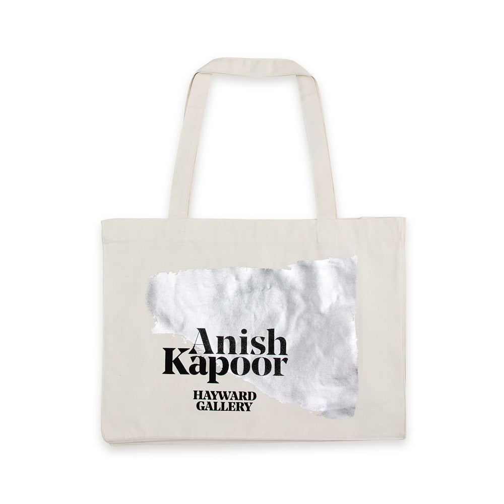 Beige tote bag with 'Anish Kapoor' and 'Hayward Gallery' text on a white background