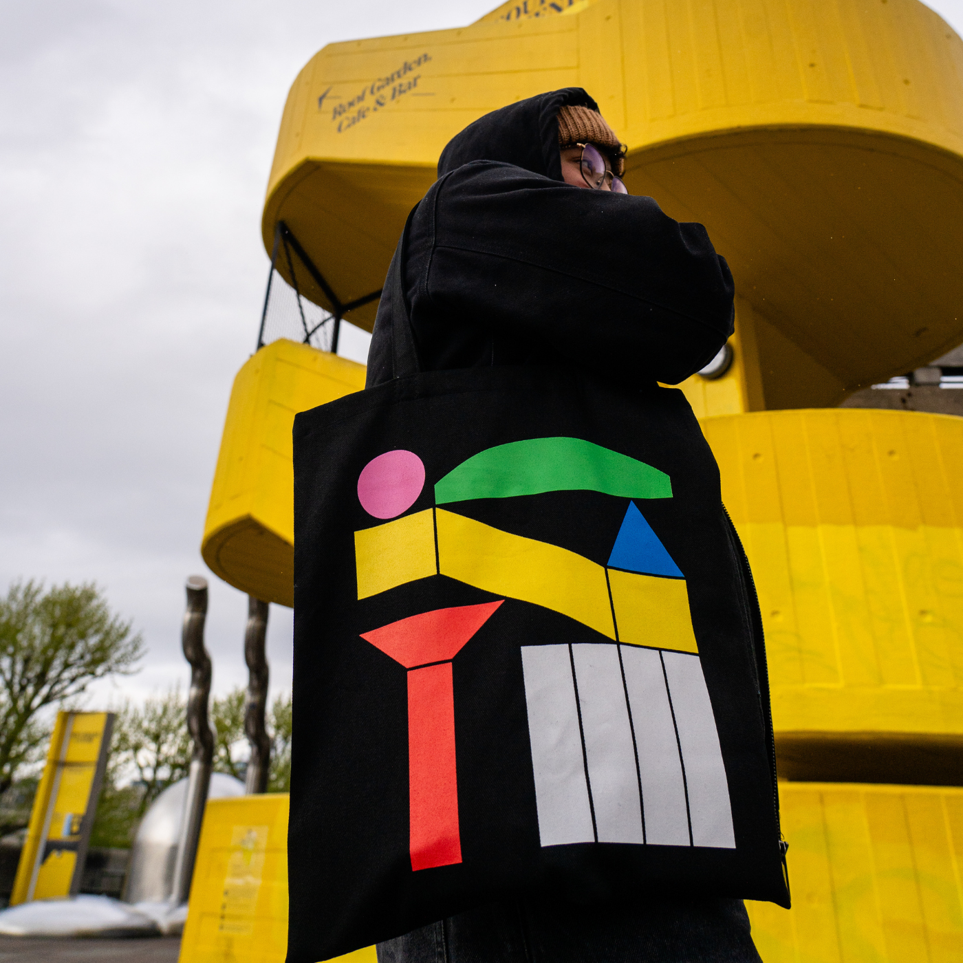 southbank centre black tote bag with geometric colourful shapes