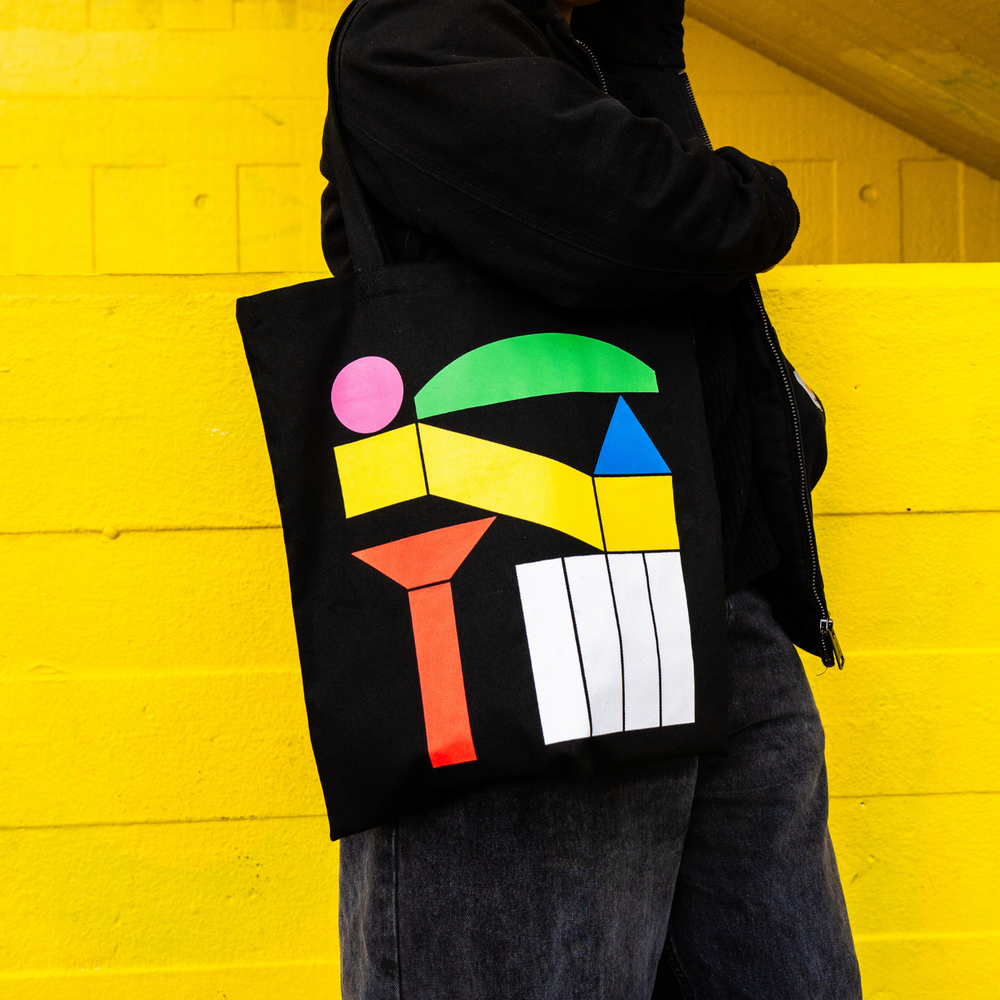 
                  
                    southbank centre tote black bag with geometric colourful shapes
                  
                