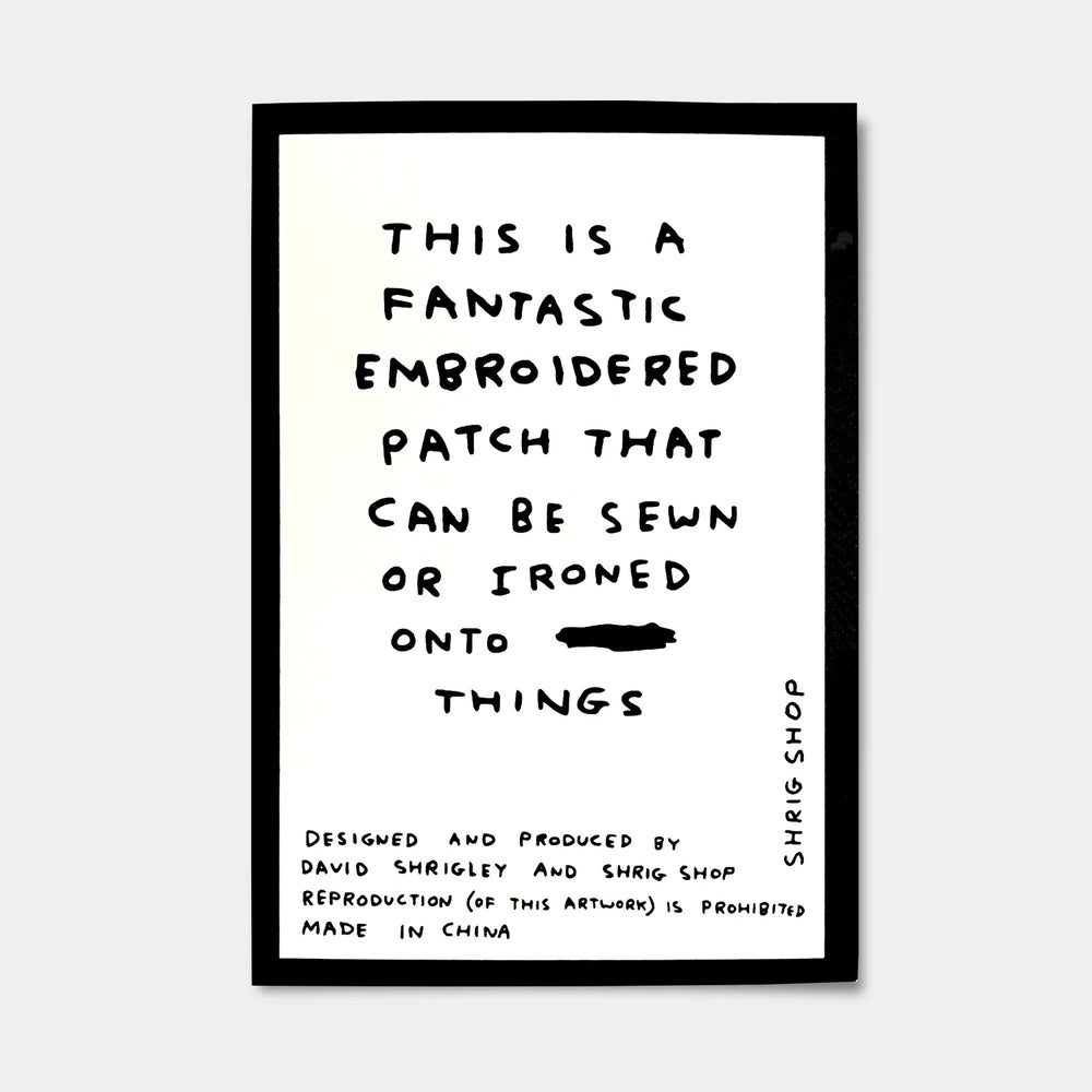
                  
                    Kiss My Paw Iron-on Patch by David Shrigley
                  
                