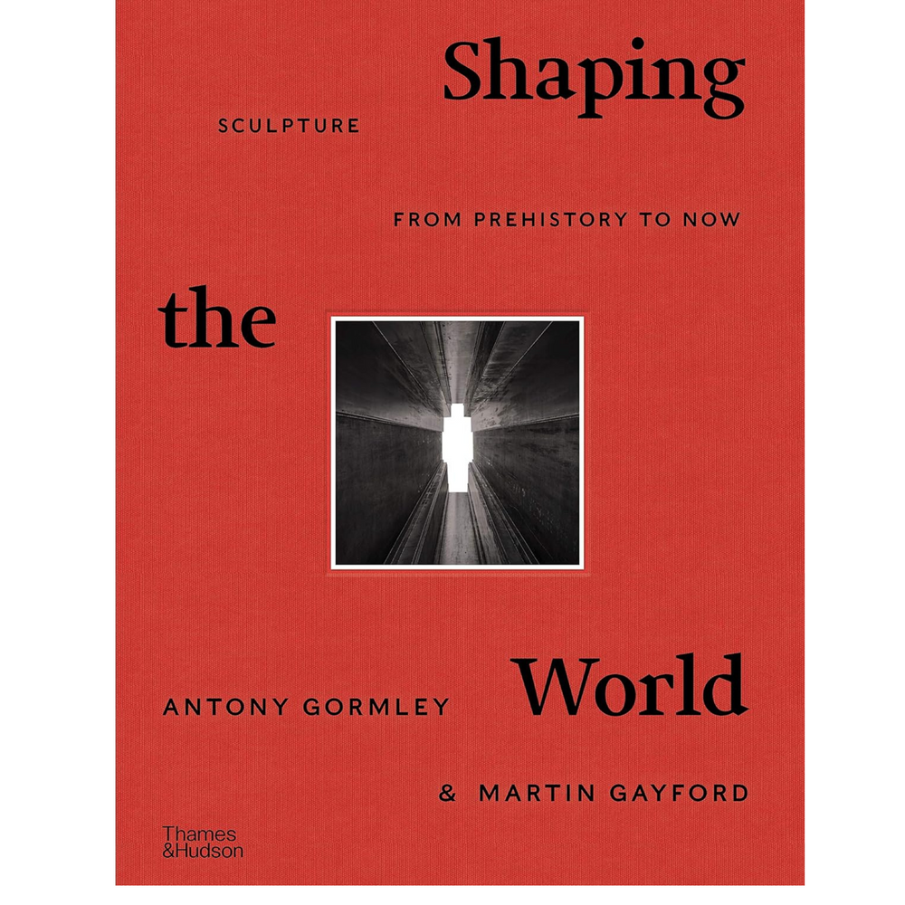 
                  
                    Cover, predominantly red, of Shaping the World book.
                  
                