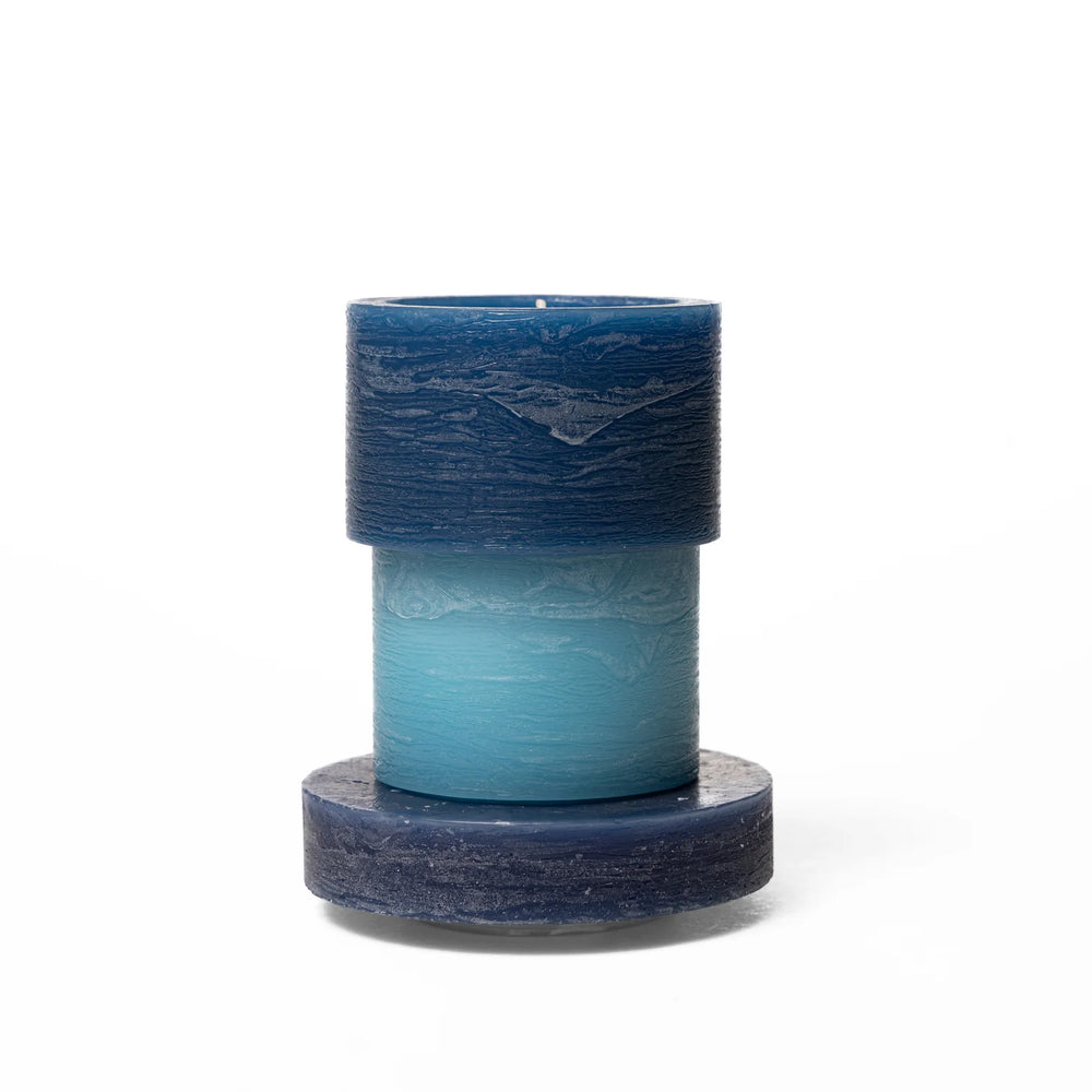 
                  
                    A blue 3-layered stacked candle
                  
                