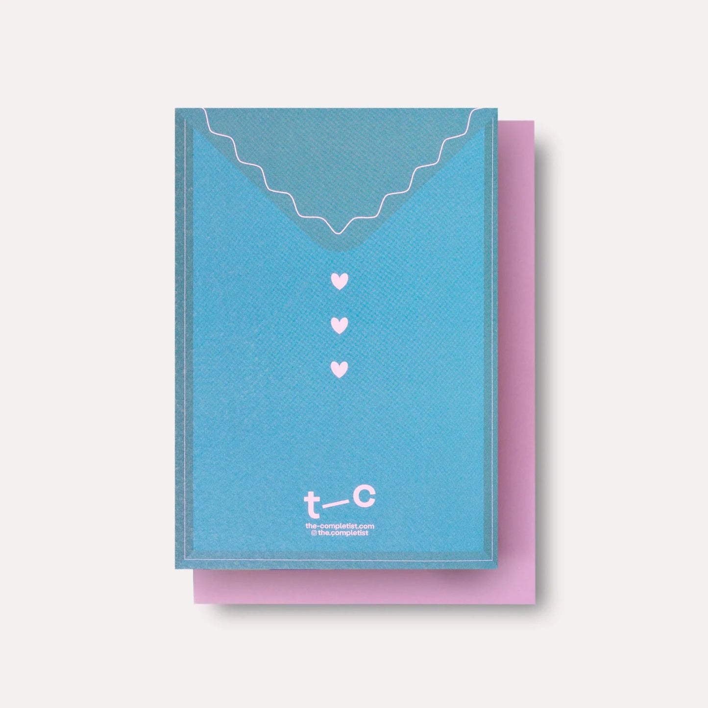 Blue and pink card with heart designs and 't-c' branding on a white background