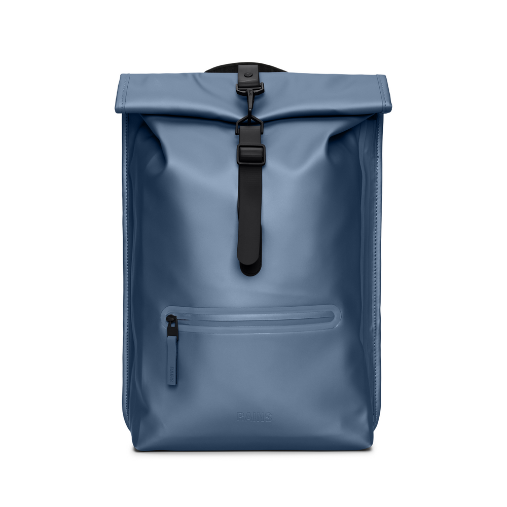 
                  
                    Front side of the Rains Rolltop Backpack, with a single black strap located in the middle, colour bay.
                  
                