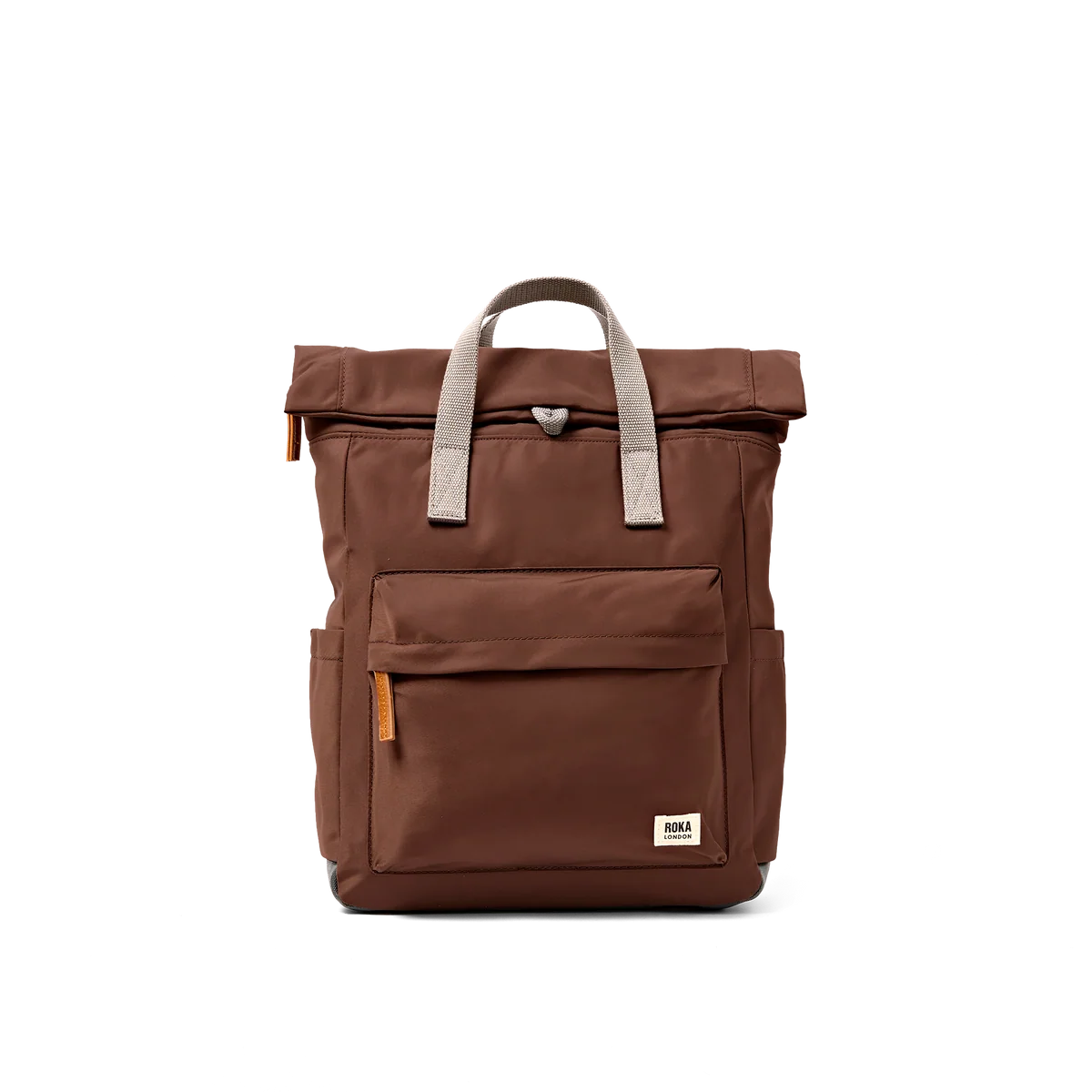 A brown roll-top backpack with light gray handles and a small white brand patch on the front pocket, shown against a plain white background.