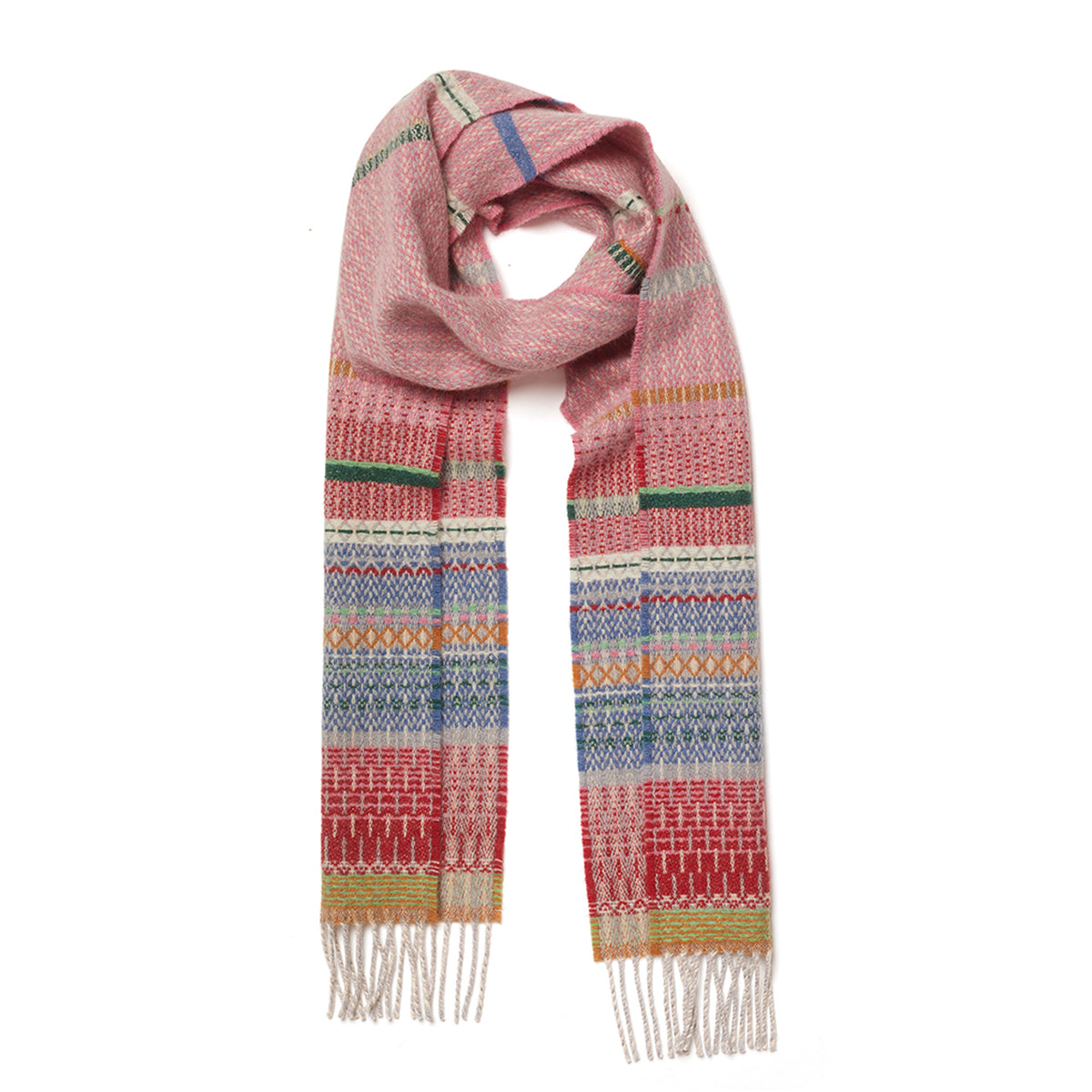 A multicolor patterned knit scarf with fringed ends, featuring horizontal bands of pink, red, blue, green, and yellow geometric designs on a white background.