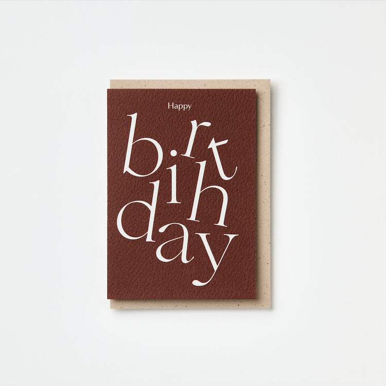 Burgundy birthday card with white text on a light grey background