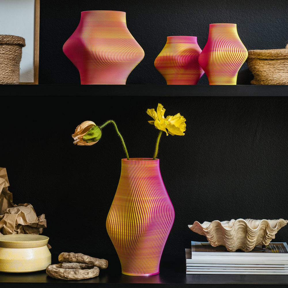 
                  
                    Sheyn 3D Printed Vases on shelves.
                  
                
