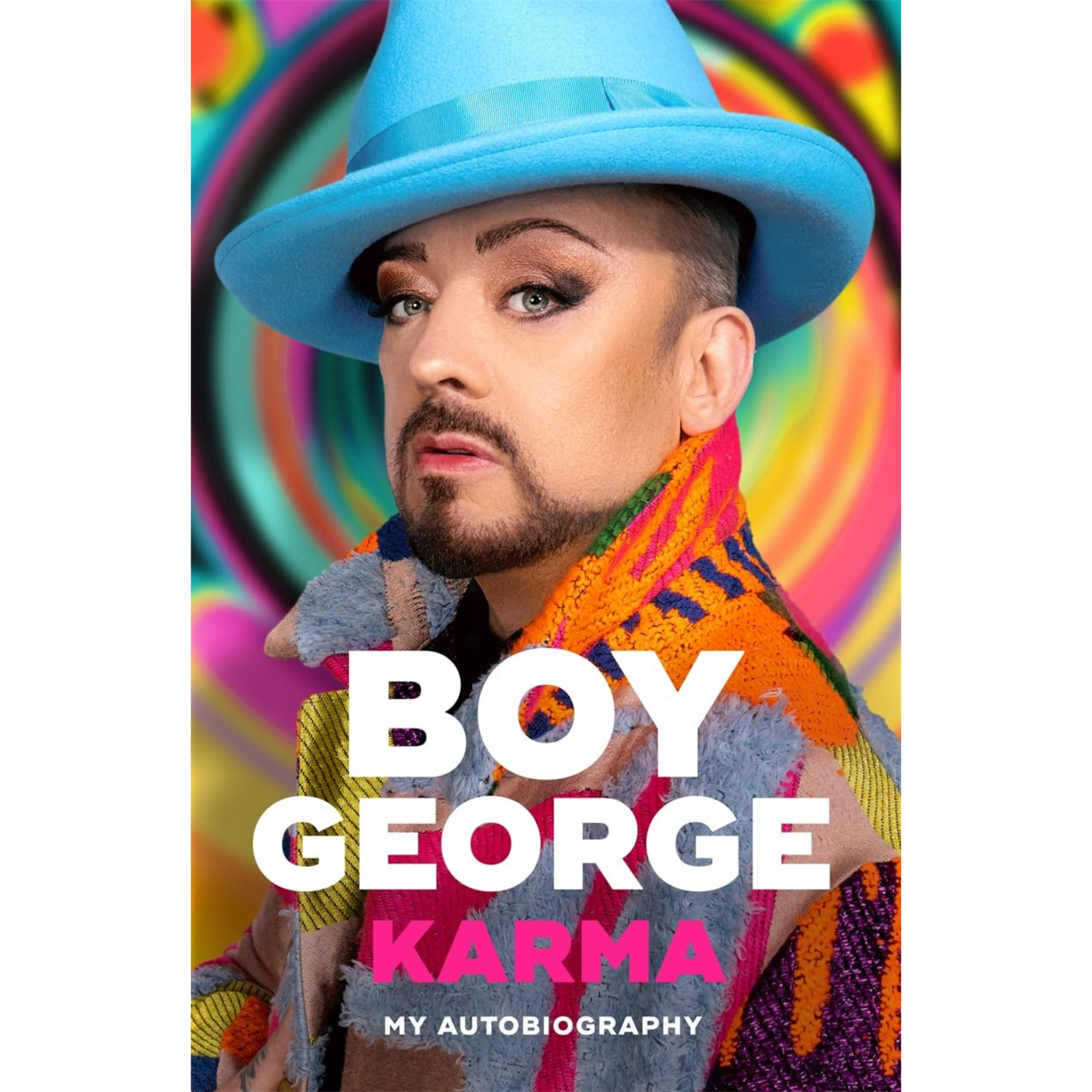 Colourful cover with portrait of Boy George in blue hat.