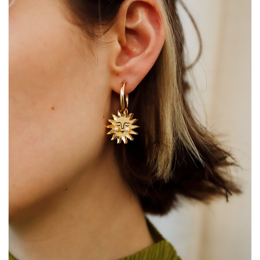 
                  
                    Sun Hoop Earrings
                  
                