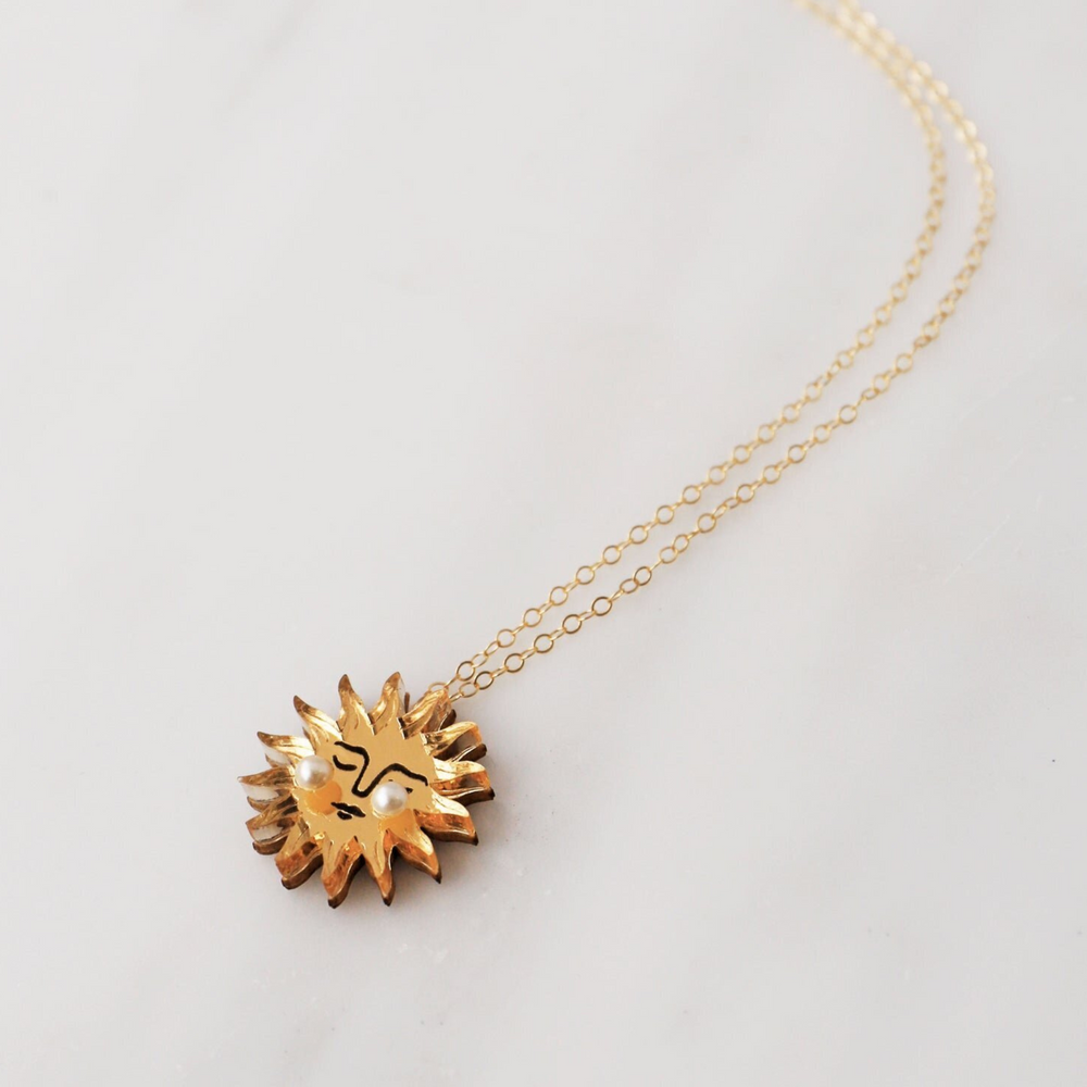 
                      
                        Sun Necklace
                      
                    