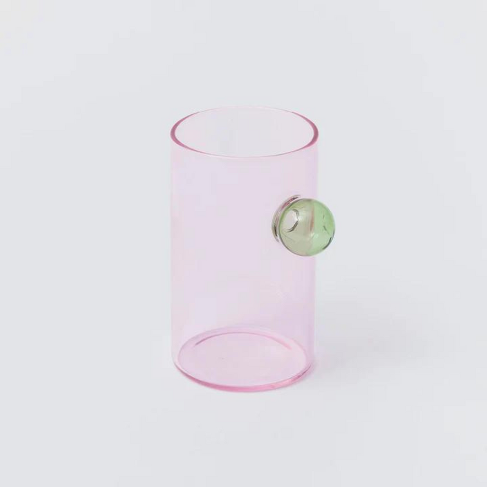 pink water glass with bubble detail.