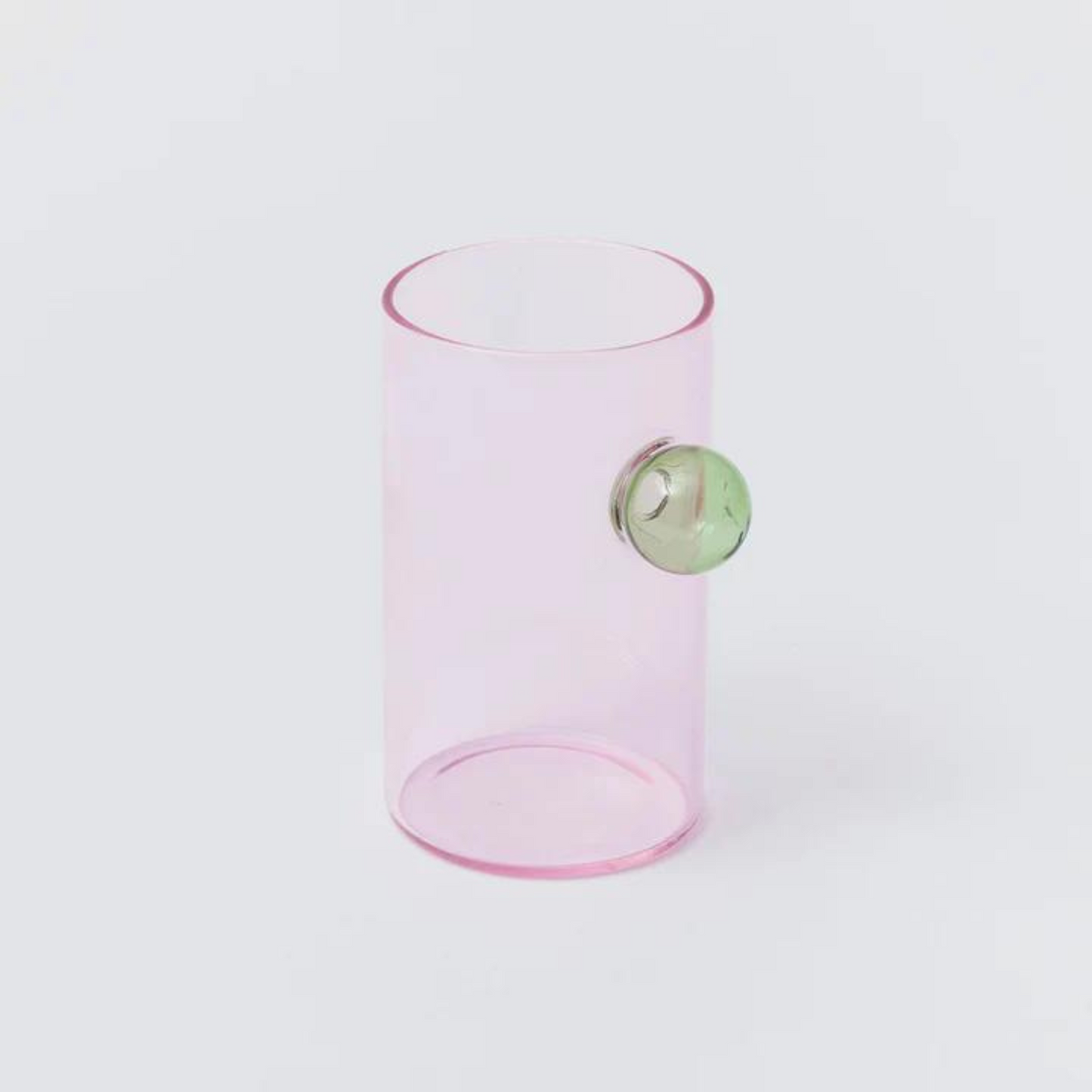 pink water glass with bubble detail.