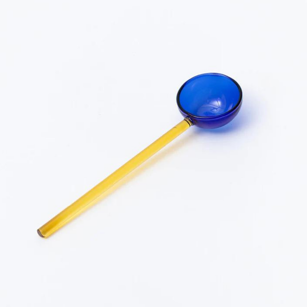 
                      
                        yellow and cobalt glass spoon.
                      
                    