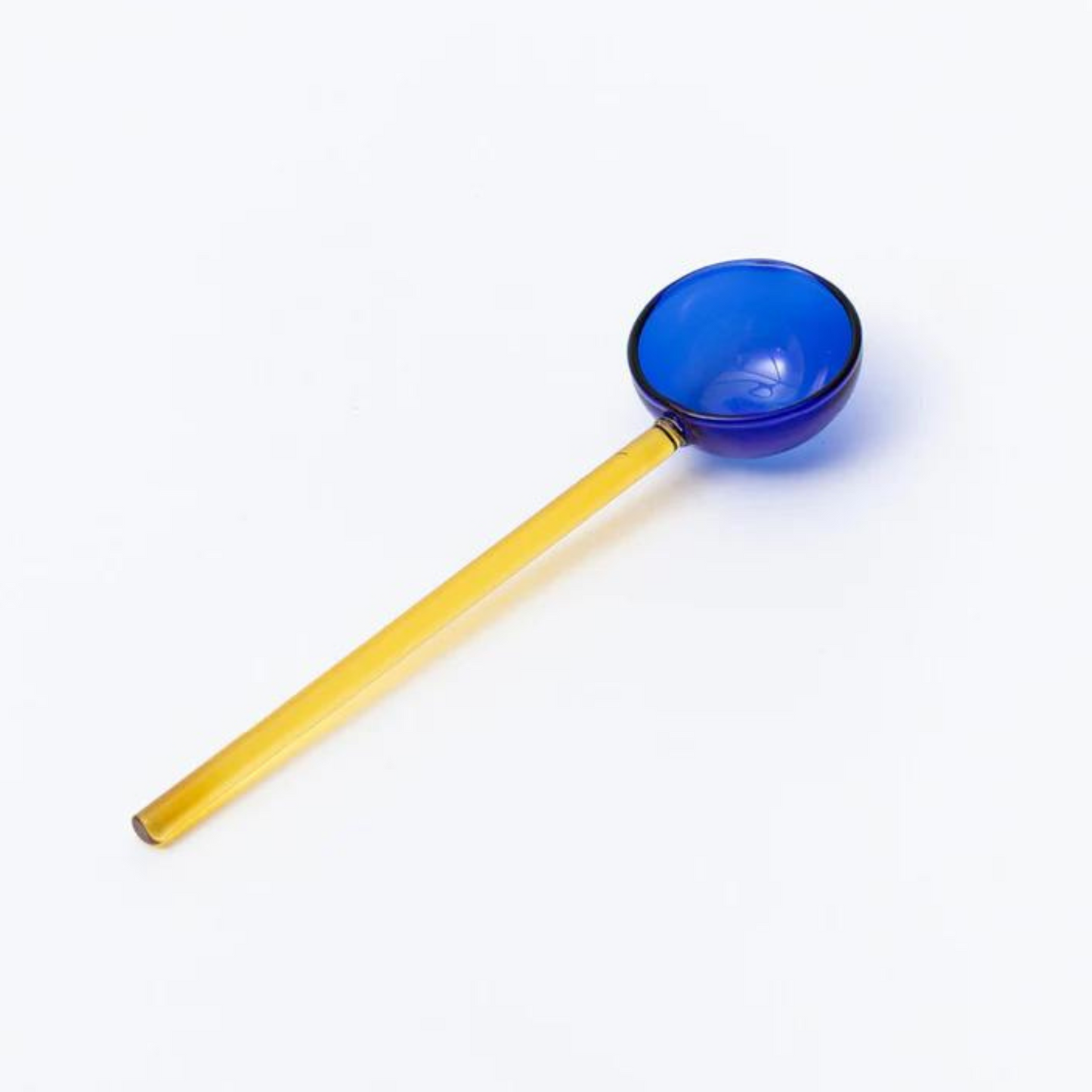 yellow and cobalt glass spoon.