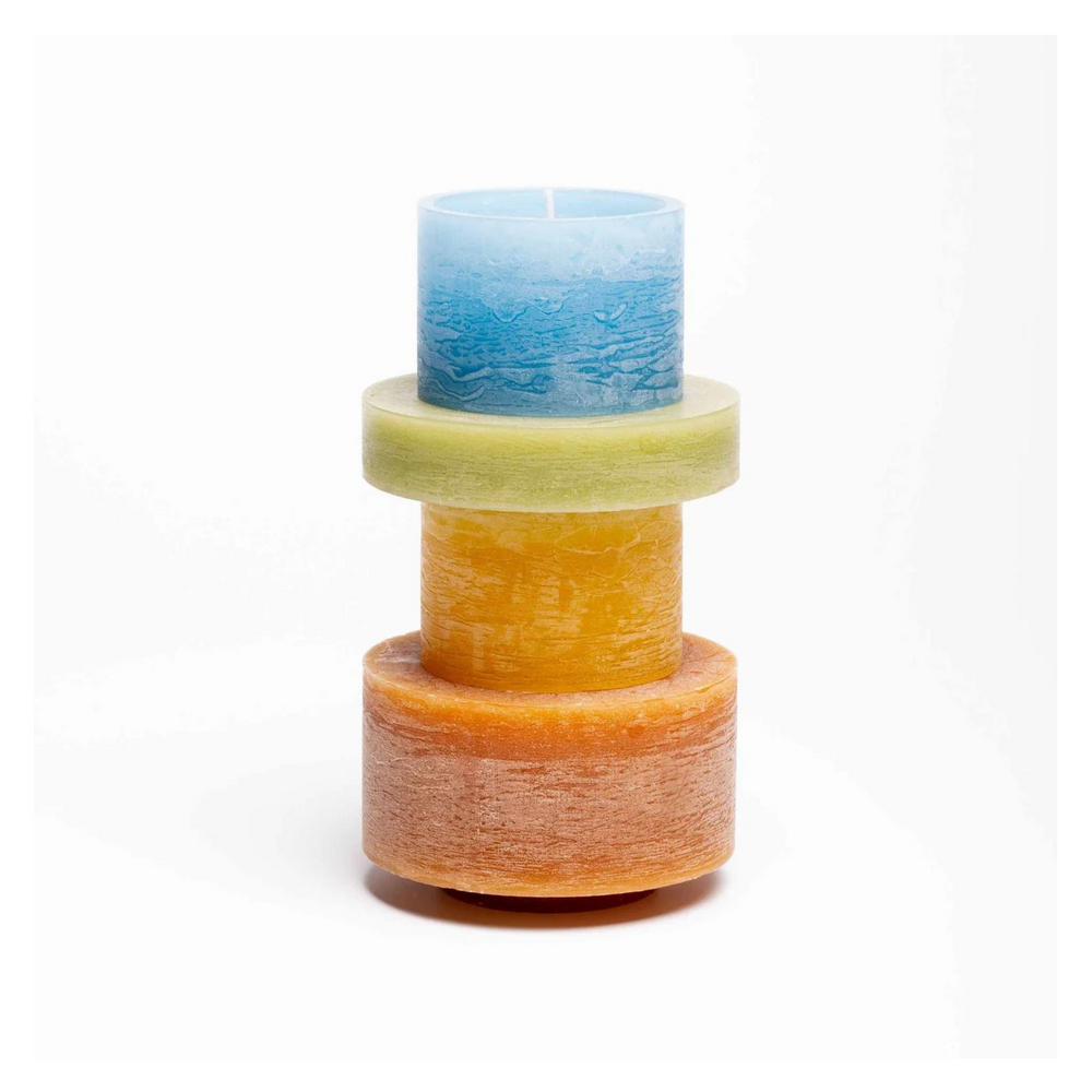 
                  
                     candle made up of 4 different colour components, stacked vertically.
                  
                