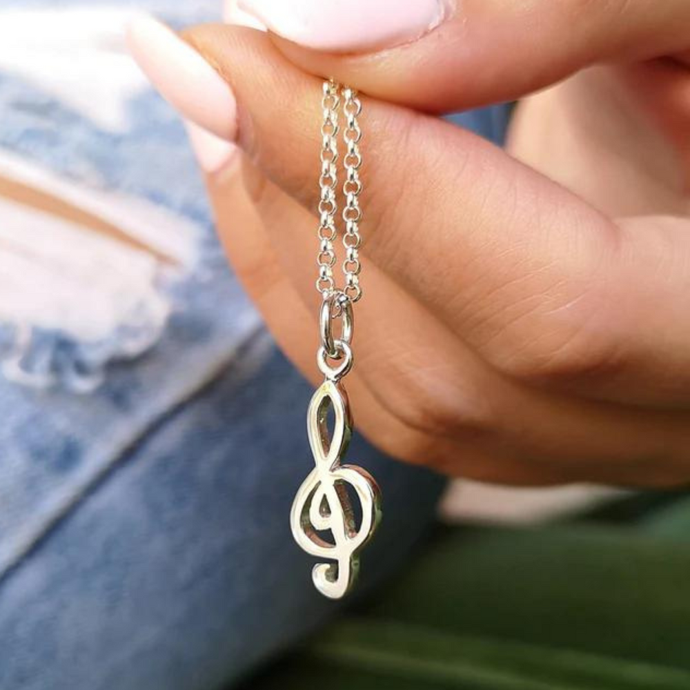 
                      
                        Treble Clef Necklace
                      
                    