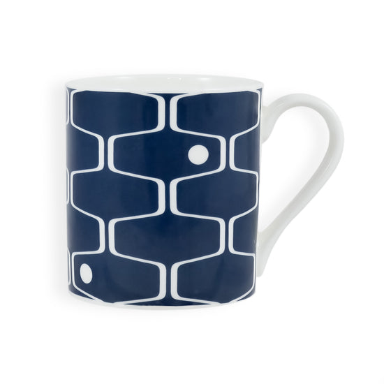 Load image into Gallery viewer, A denim blue mug featuring the net &amp;amp; ball pattern
